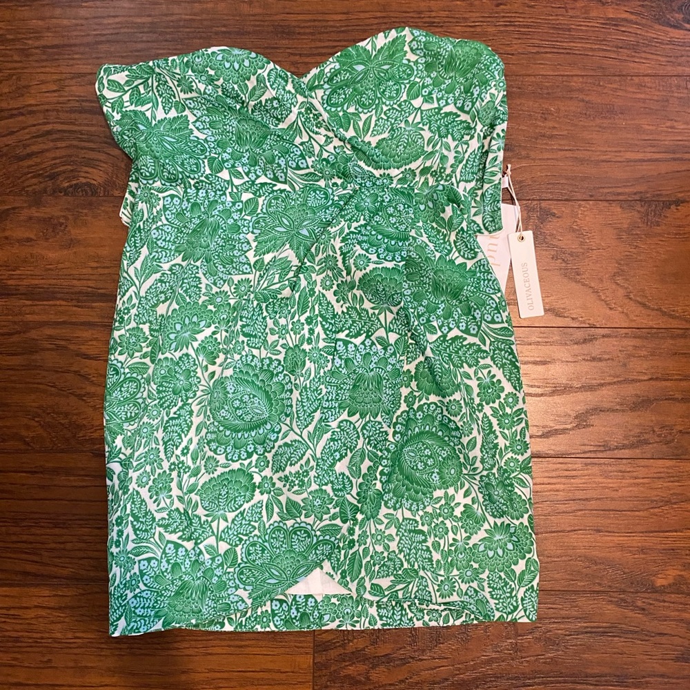 Green patterned strapless mini dress